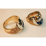pair of gold wedding rings