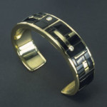 14k gold bracelet with black onlx