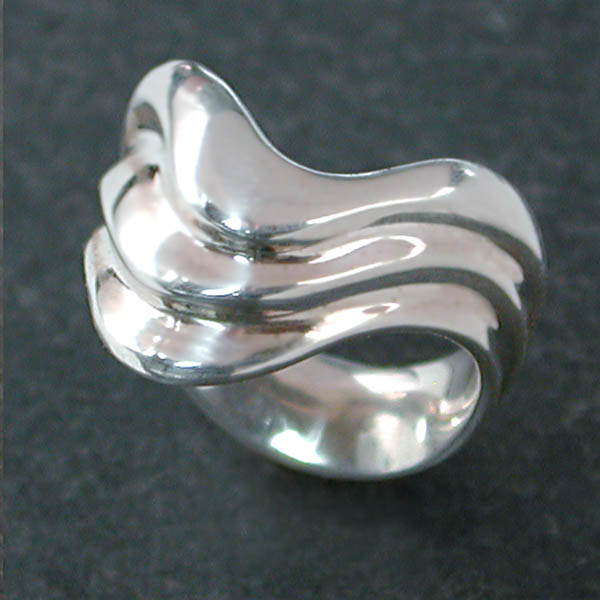 Three layers add interest to this curvy sterling silver ring.