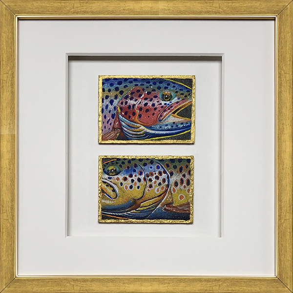 Two art cards, a brown trout and a rainbow trout, are handsomely framed with a white mat.